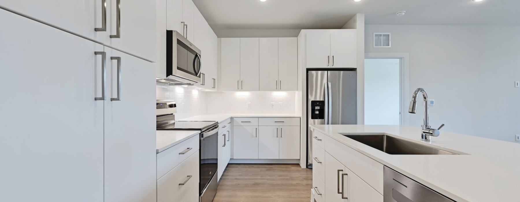 Well-lit kitchen with ample counter space